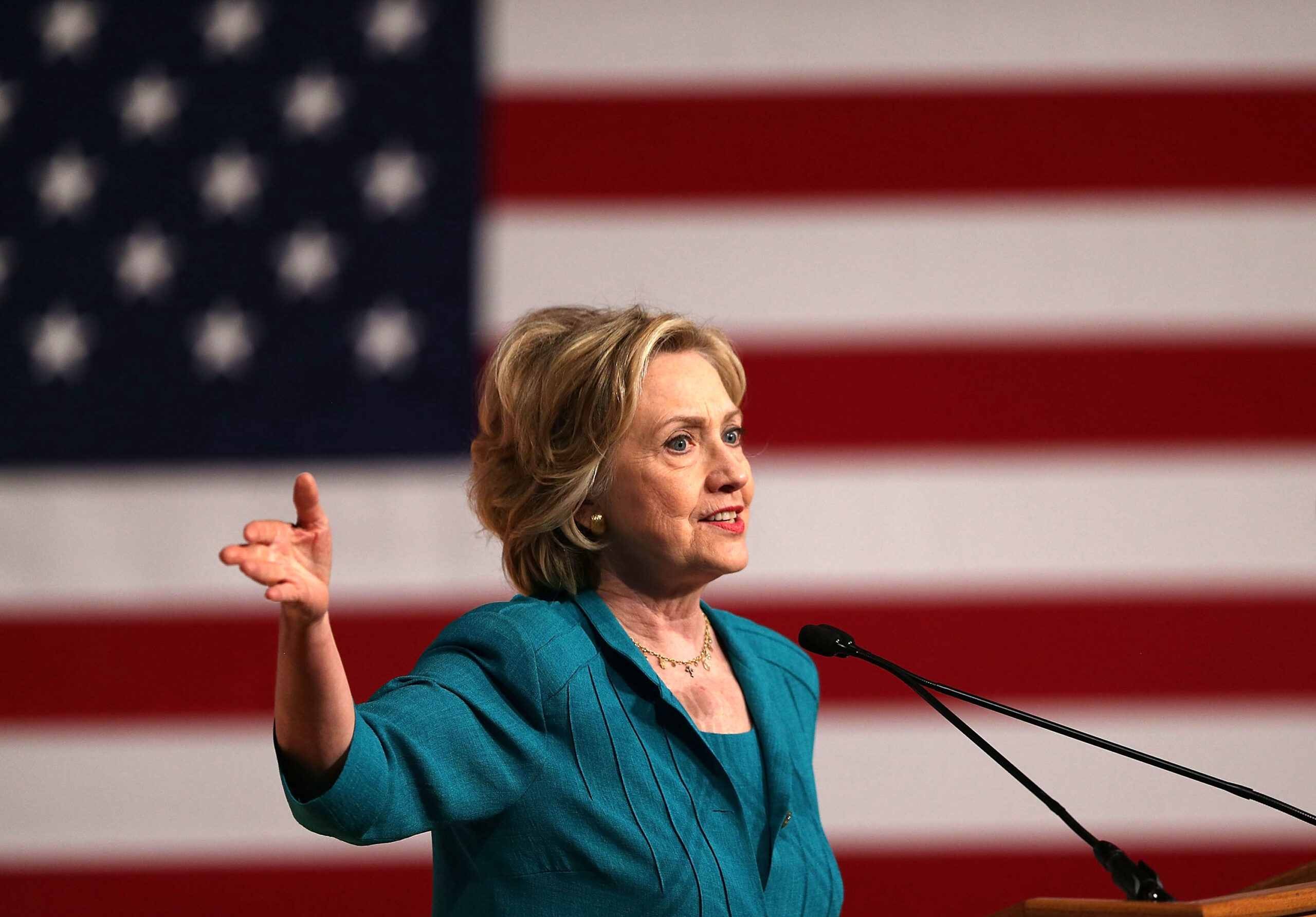 Clinton backs Obama climate rules as GOP attacks