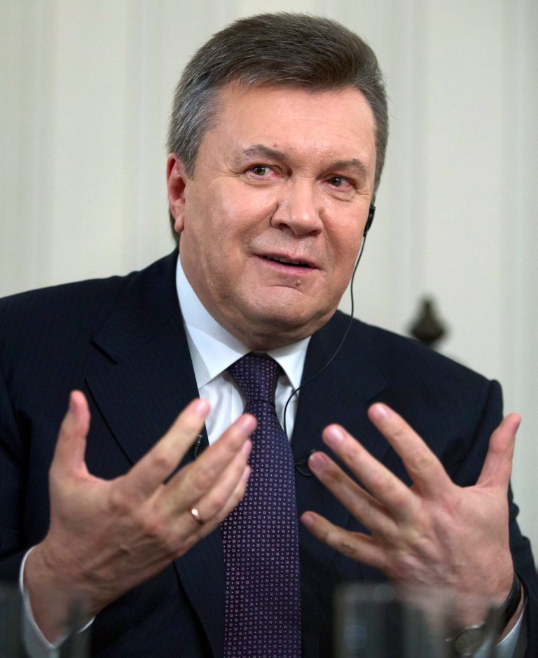 Ousted Ukrainian President Viktor Yanukovych gestures during an interview with The Associated Press, in Rostov-on-Don, Russia, Wednesday, April 2, 2014. Yanukovych says the annexation of Crimea was a tragedy and he would have done everything possible to prevent it, had he remained in power. (AP Photo/Ivan Sekretarev)