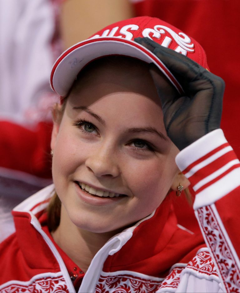 Julia Lipnitskaia of Russia waits in the results area after competing in the women's team free skate figure skating competition at the Iceberg Skating Palace during the 2014 Winter Olympics, Sunday, Feb. 9, 2014, in Sochi, Russia. (AP Photo/Darron Cummings, Pool)