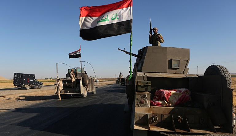 Federal Iraqi security forces gather outside the Kurdish hold City of Altun Kupri, outskirts of Irbil, Iraq, Thursday Oct. 19. 2017. (AP Photo/Khalid Mohammed)