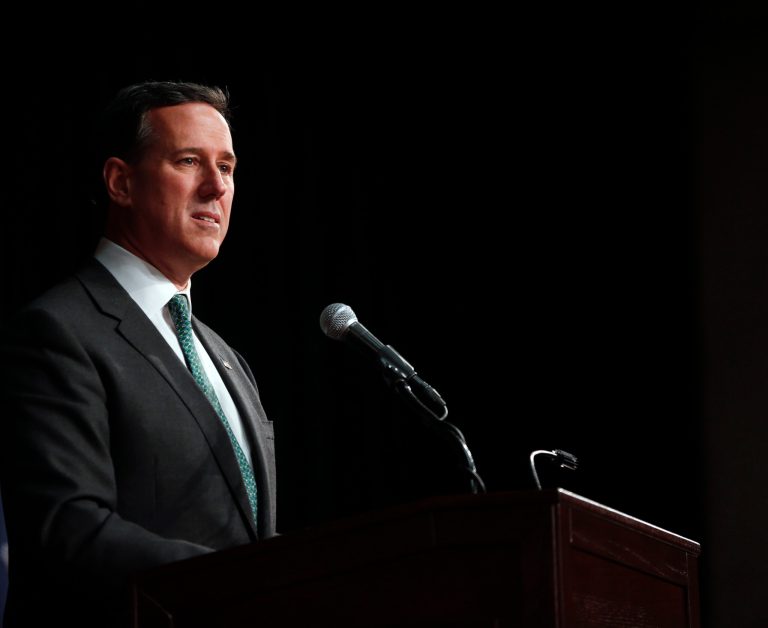 Rick Santorum argues that such a small percentage of Americans actually make the minimum wage. (AP Photo)