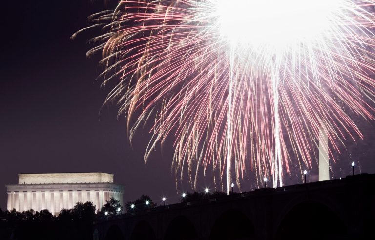 A view of fireworks above the Lincoln Memorial, Washington Memorial and Memorial Bridge on the National Mall in Washington from along the shore of the Potomac River July 4, 2011 in Arlington.   (Photo by Brendan Smialowski/Getty Images)