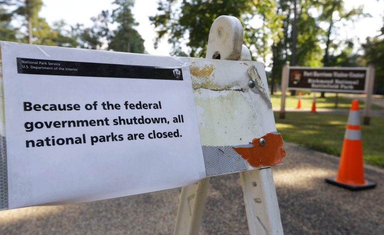  A sign to the parking lot to the Fort Harrison visitor center on the Richmond National Battlefield Park announces that the park is closed in Richmond, Va., Tuesday, Oct. 1, 2013. 