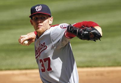 Charles Rex Arbogast/AP
Nationals right-hander Stephen Strasburg has allowed one earned run over 13 innings in his first two starts of the season.