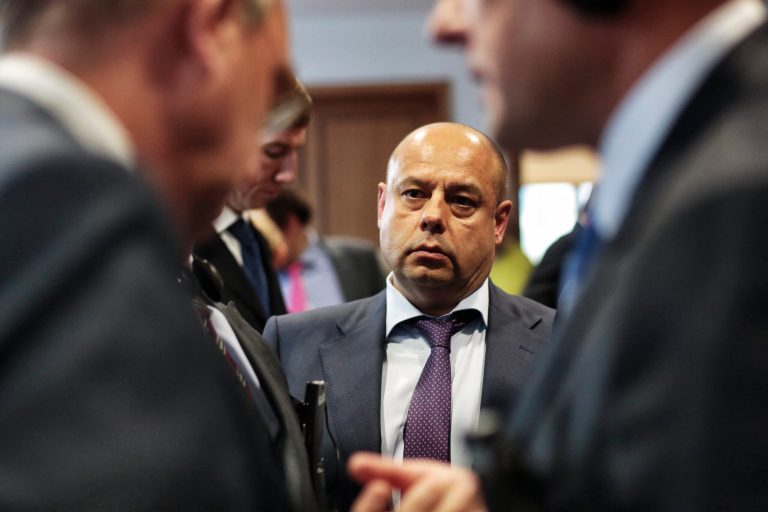 Ukrainian Energy Minister Yuriy Prodan attends to a news conference of European Union Commissioner Guenther Oettinger in Berlin, Friday, Sept. 26, 2014. Trilateral gas talks between the European Union, Russia and Ukraine about gas supply from Russia for Europe during the upcoming winter take place in the German capital. (AP Photo/Markus Schreiber)