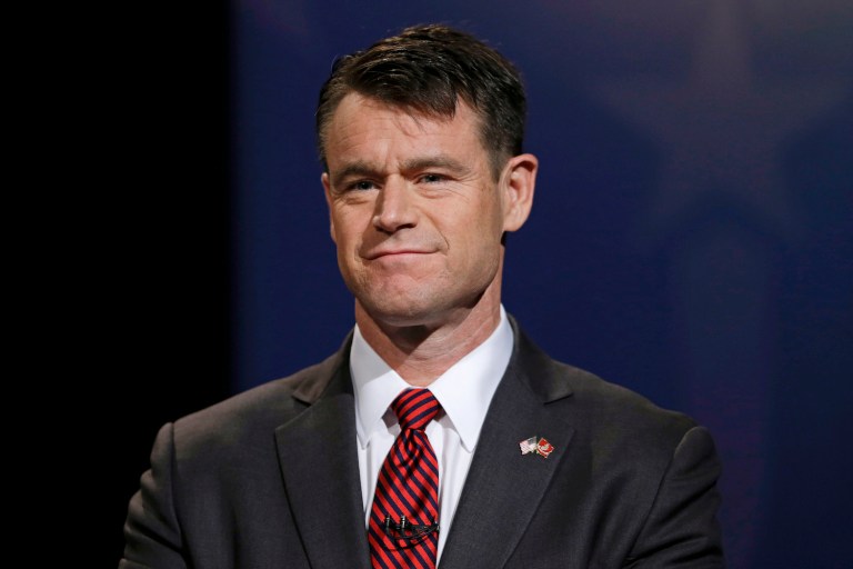 Sen. Todd Young is making the case to Democrats that the REINS Act could rein in President-elect Trump's executive power. (AP Photo/Michael Conroy, pool File)