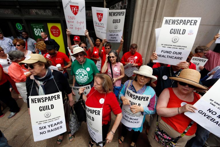 Members of the Philadelphia Inquirer, Philadelphia Daily News and their supporters demonstrate outside their offices Thursday, June 25, 2015, in Philadelphia. (AP Photo/Matt Rourke)