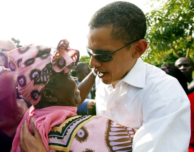 Then U.S. Sen. Barack Obama meets with his step-grandmother at his father's house in western Kenya in 2006. On Friday, July 24, Obama is due to arrive in Kenya for the first time since he was a senator. (AP Photo/Sayyid Azim)