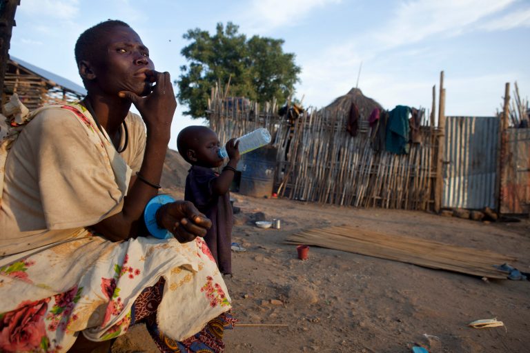 A poor family living in a small shack in the city center tries to survive selling fruits at a local market July 19, 2012 in Juba, South Sudan. (Photo by Paula Bronstein/Getty images)