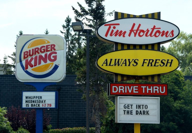 Burger King is in talks to buy Tim Hortons in hopes of creating a new, publicly traded company with its headquarters in Canada. (AP Photo/The Canadian Press, Sean Kilpatrick)