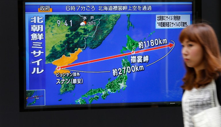 North Korea fired a ballistic missile from its capital Pyongyang that flew over Japan before plunging into the northern Pacific Ocean, officials said Tuesday. It was an aggressive test-flight over the territory of a close U.S. ally that sends a clear message of defiance as Washington and Seoul conduct war games nearby. (AP Photo/Shizuo Kambayashi)