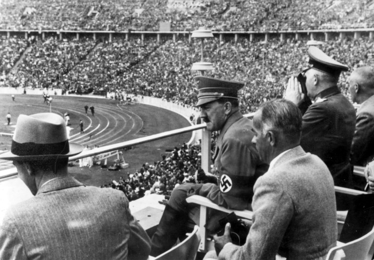 Dr. Joseph Goebbels, German Chancellor Adolf Hitler, Reichs Sports Leader Hans von Tschammer und Osten and Generalfeldmarschall Werner von Blomberg observe the Olympic Games in Berlin, Germany in August 1936. (AP Photo)