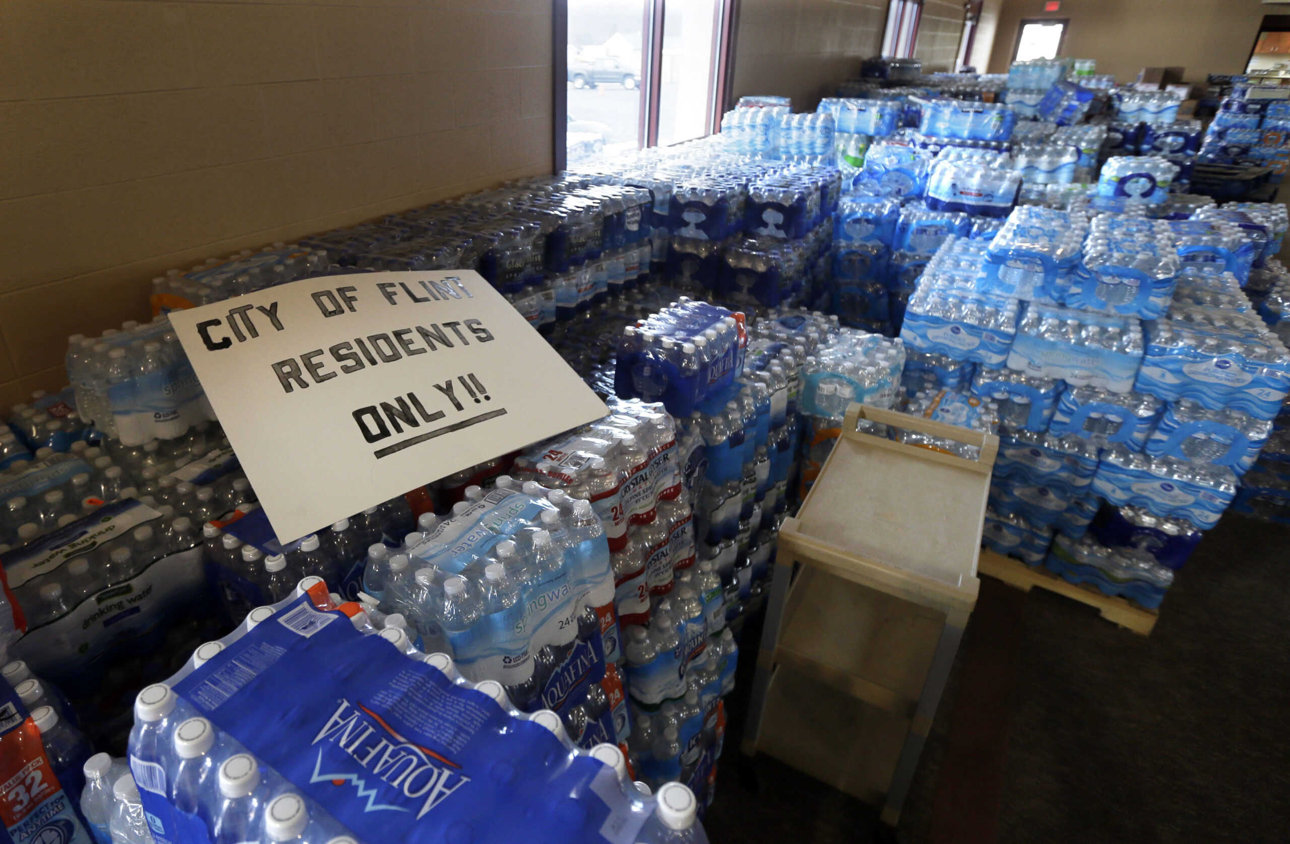 Michigan to charge three for role in Flint water crisis