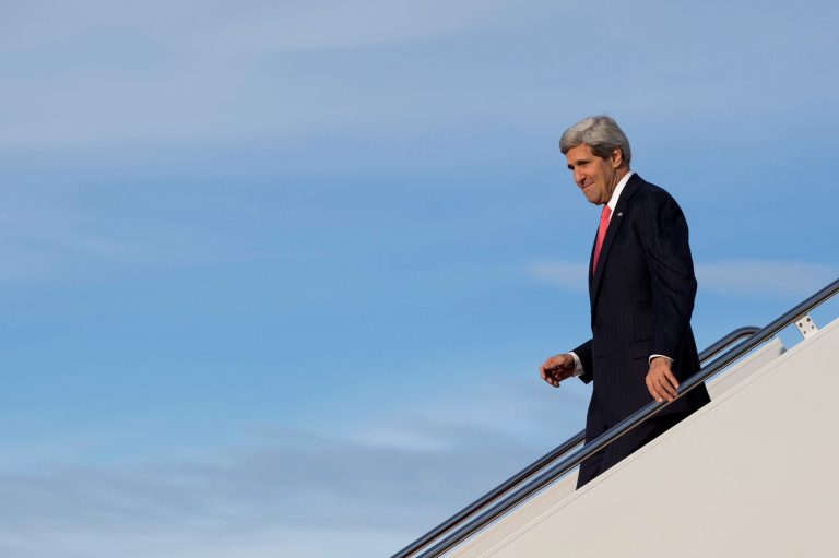 Secretary of State John Kerry steps off of his aircraft as he arrives at Andrews Air Force Base, Md., Monday, Nov. 25, 2013, as he returns from London. While in London, Kerry had meetings with Libyan's Prime Minister Ali Zeidan and British Foreign Secretary William Hague. Prior to London, Kerry was in in Geneva, Switzerland, for the Iran nuclear talks.  European Union sanctions against Iran could be eased as soon as December, officials said Monday, after a potentially history-shaping deal that gives Tehran six months to increase access to its nuclear sites in exchange for keeping the core components of its uranium program. (AP Photo/Carolyn Kaster, Pool)