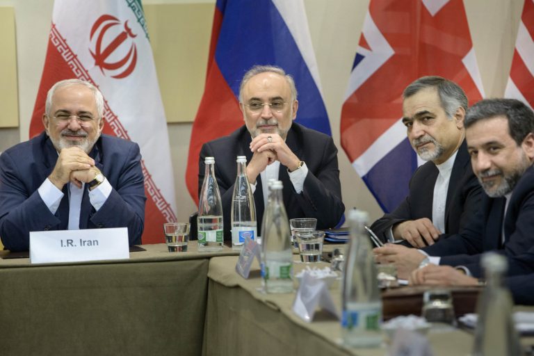 Iranian Foreign Minister Javad Zarif, left, Head of Iranian Atomic Energy Organization Ali Akbar Salehi, second left, Special Assistant to Iranian president Hossein Fereydoun, second right, and Iranian Deputy Foreign Minister Abbas Araghchi wait for the start of a meeting with Britain, Russia, China, France, Germany, European Union and the U.S. officials during Iran nuclear talks. (AP Photo/Brendan Smialowski, Pool)