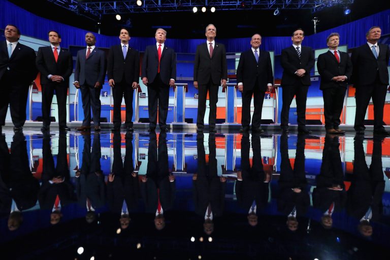 Republican presidential candidates take the stage for the first prime-time presidential debate hosted by FOX News and Facebook at the Quicken Loans Arena August 6, 2015 in Cleveland, Ohio. (Photo by Chip Somodevilla/Getty Images)