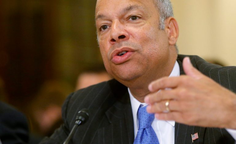 FILE - In this June 24, 2014, file photo, Homeland Security Secretary Jeh Johnson testifies on Capitol Hill in Washington. Johnson is ordering increased security measures at some overseas airports offering direct flights to the United States. The Homeland Security Department would not immediately say July 2 whether the increased measures were in response to intelligence about a specific threat. But a U.S. counterterrorism official says American intelligence has seen indications that certain terrorist groups in Yemen and Syria are working on a bomb that could make it through airport security undetected.  (AP Photo/Charles Dharapak, File)
