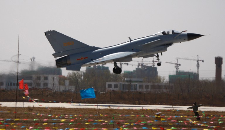 Two J-10 Chinese Air Force jets came close to downing a U.S. Navy EP-3 reconnaissance plane this weekend. (AP Photo/Alexander F. Yuan)