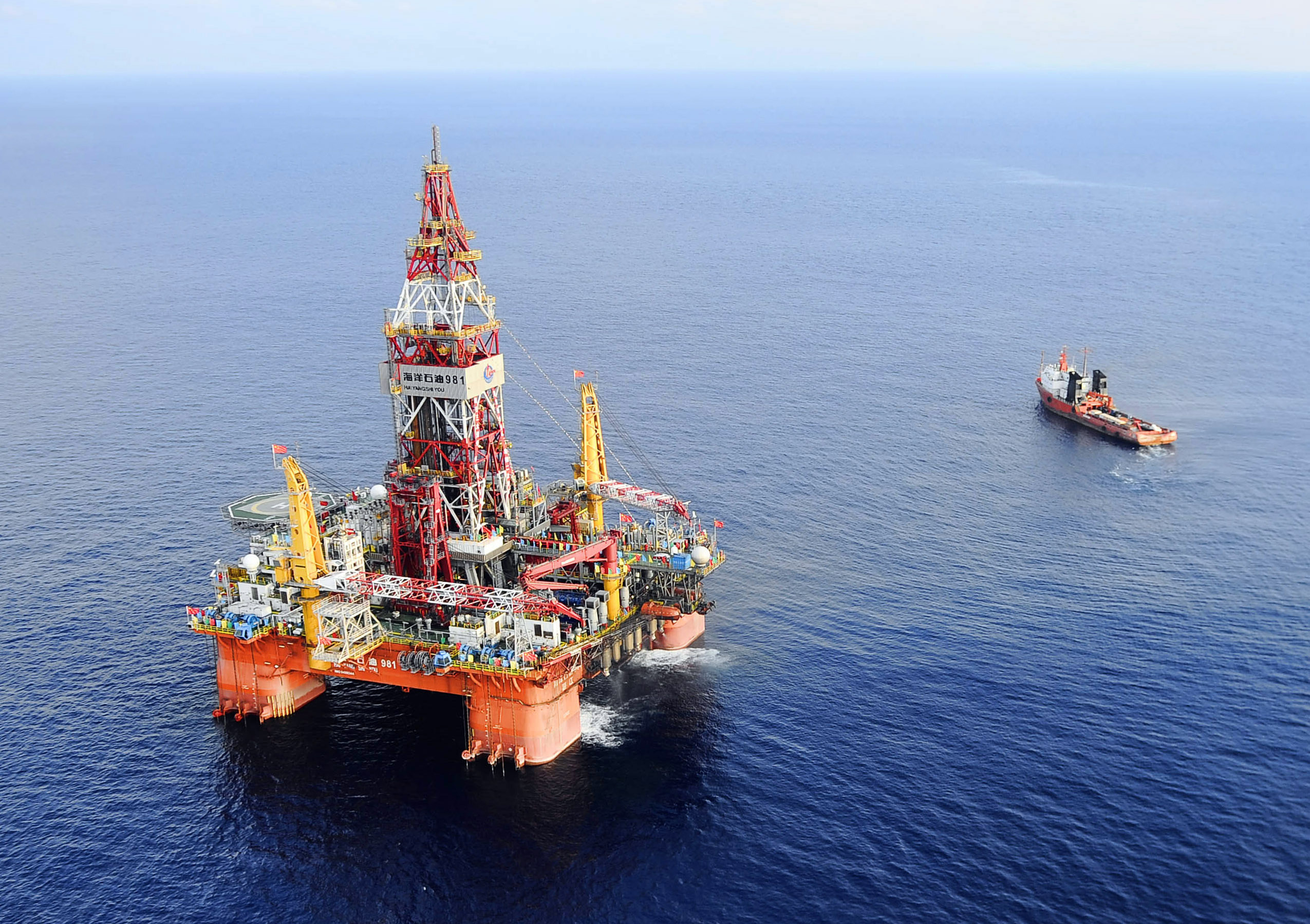 China moves oil rig out of waters Vietnam claims