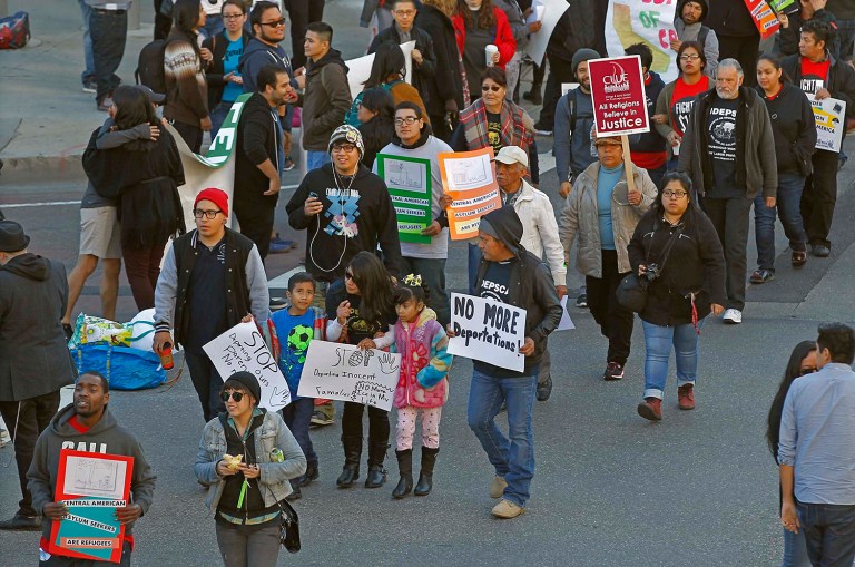 Immigration activists march in rally against the U.S. Immigration and Customs Enforcement raids and deportation of immigrants. President Trump has promised to enforce strict immigration laws that were sidestepped or largely ignored under the previous administration. (AP Photo/Nick Ut)