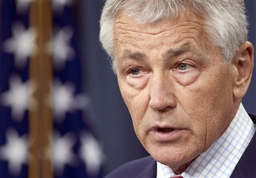 Defense Secretary Chuck Hagel speaks during a news conference at the Pentagon, Friday, March 15, 2013, to announce that the Obama administration will add 14 interceptors to a West Coast-based U.S.-based missile defense system reflecting concern about North Korea's focus on developing nuclear weapons and its advances in long-range missile technology. (AP Photo/Cliff Owen)