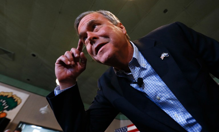 Former Florida Gov. Jeb Bush on Tuesday half-jokingly recommended that Melania Trump seize Donald's phone so that he can focus on his duties as president, not tweeting in response to unfavorable media coverage. (AP Photo/Paul Sancya)