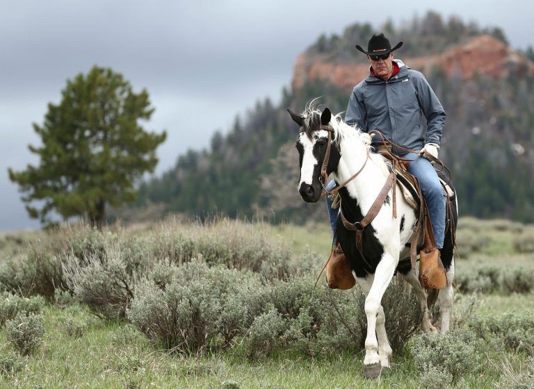 Interior Secretary Ryan Zinke enjoys a horseback ride in the Bears Ears National Monument with local and state representatives in Blanding, Utah, on May 9. Opponents and supporters of the national monument have jockeyed for position with Zinke on his four-day visit to Utah. (Scott G Winterton/The Deseret News via AP)