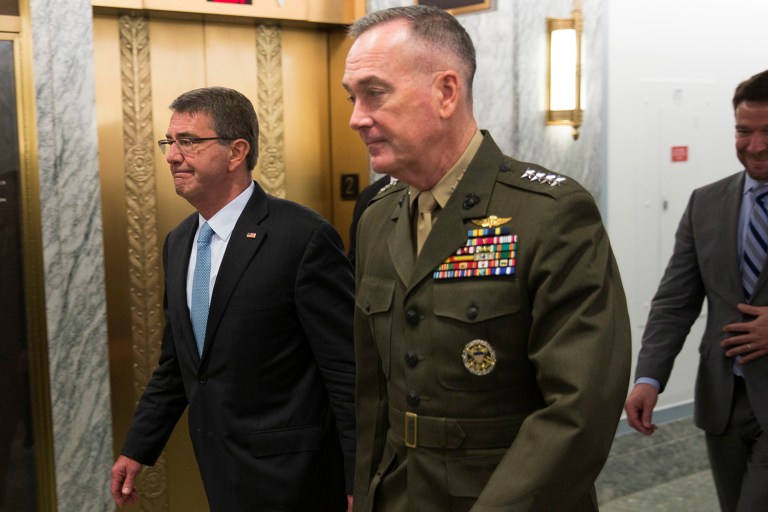 Defense Secretary Ash Carter and Joint Chiefs Chairman Gen. Joseph Dunford avoided directly answering whether they trust Russia. (AP Photo/Evan Vucci)