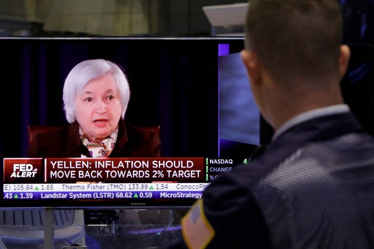 A trader on the floor of the New York Stock Exchange watches Federal reserve Chair Janet Yellen's news conference, Wednesday, March 18, 2015. The Federal Reserve is signaling that it's edging closer to raising interest rates from record lows in light of a strengthening job market. (AP Photo/Richard Drew)