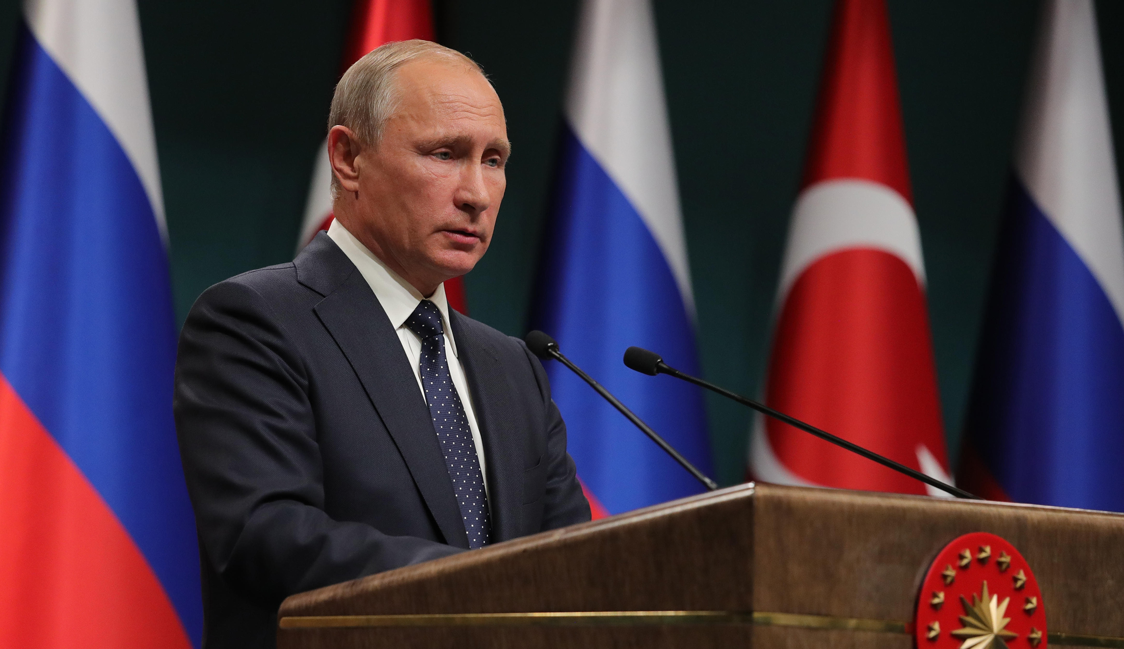 Russia threatens US media after Trump tightens rules on RT
