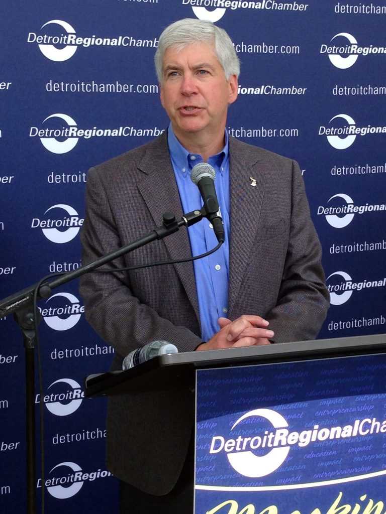 Gov. Rick Snyder speaks during the Mackinac Policy Conference, Thursday, May 29, 2014 on Mackinac Island, Mich. Snyder is urging legislators to consider updating Michigan's civil rights law to prohibit discrimination because of sexual orientation or gender identity. (AP Photo/David Eggert)