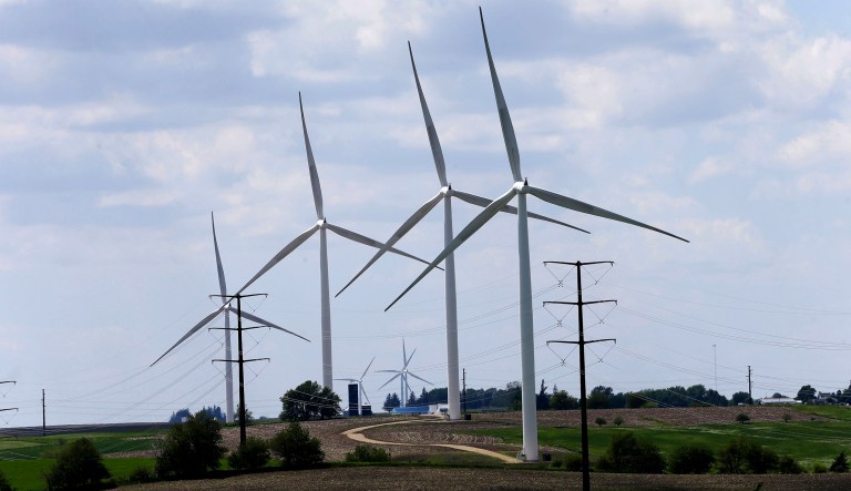Renewable groups and advocates for electric vehicles are worried about provisions in the House tax plan that would weaken tax credits for the wind industry and eliminate the credit for electric vehicles. (AP Photo/Charlie Neibergall,File)