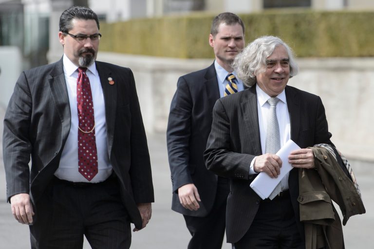US Secretary of Energy Ernest Moniz, right, takes a walk during a break of the new round of talks on Iran's nuclear program, in Lausanne, Switzerland, Monday, March 30, 2015. (AP Photo/Keystone, Jean-Christophe Bott)