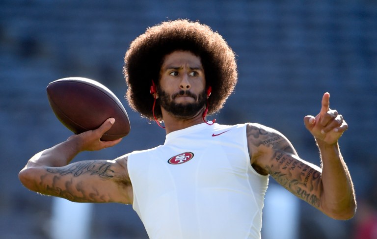 Colin Kaepernick became a political flashpoint last season when he began taking a knee during the national anthem to protest the treatment of African American and minorities in the U.S., especially in regards to police brutality. (AP Photo/Denis Poroy)