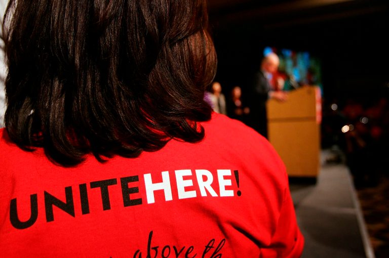 A union member listens during a UNITE HERE unionized hotel workers campaign on February 16, 2006 in Los Angeles. (Photo by David McNew/Getty Images)