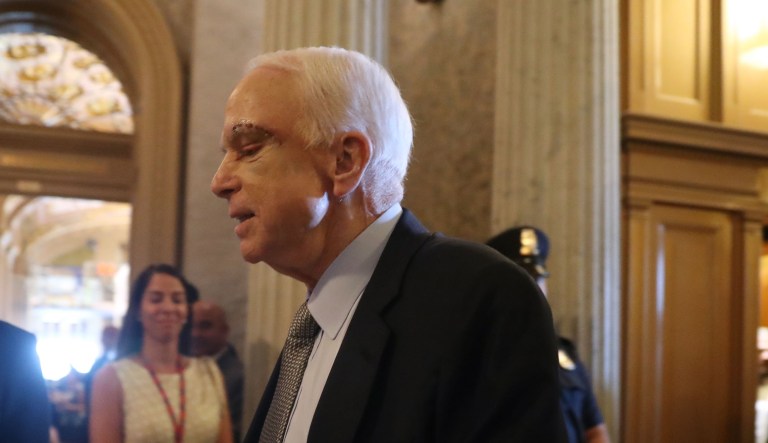 Sen. John McCain said Wednesday that the Senate's annual defense policy bill was being held up on the chamber floor over a disagreement with four senators over their amendments. (AP Photo/Andrew Harnik)