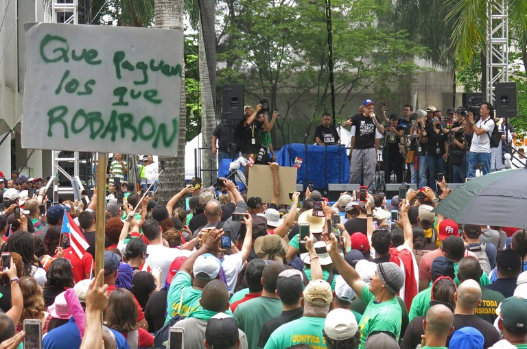 The island territory is struggling to find a way to pay its $70 billion debt. (AP Photo/Danica Coto)