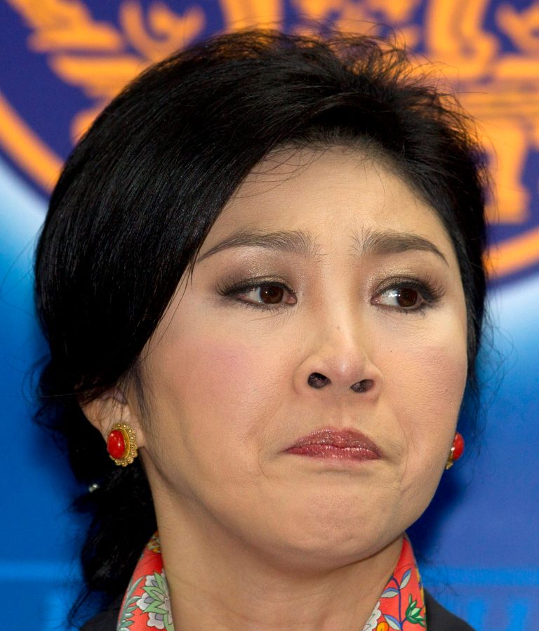 In this picture take on May 7, 2014. Thai Prime Minister Yingluck Shinawatra talks to media during a press conference in Bangkok, Thailand. An anti-corruption body has recommended criminal charges against the ousted Thai prime minister over her government's rice subsidy program. (AP Photo/Sakchai Lalit)