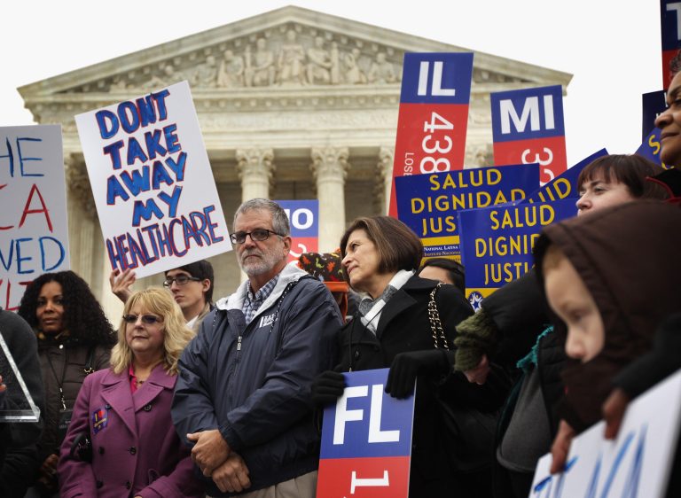 Supporters of the Affordable Care Act gather in front of the U.S Supreme Court during a rally March 4, 2015 in Washington, DC. (Photo by Alex Wong/Getty Images)