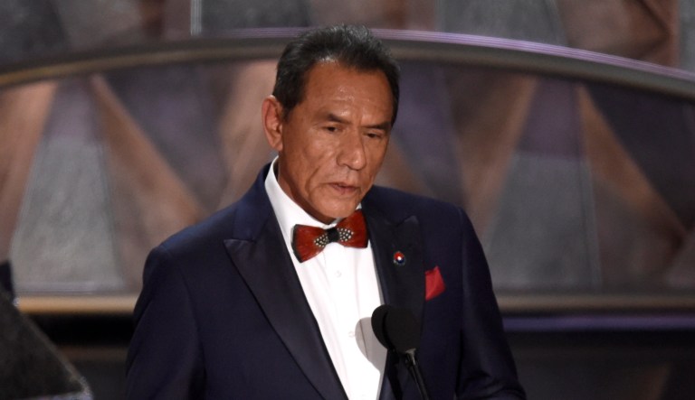 At the Oscars Sunday night, actor Wes Studi introduced a tribute to films that honor service in the military. (Photo by Chris Pizzello/Invision/AP)