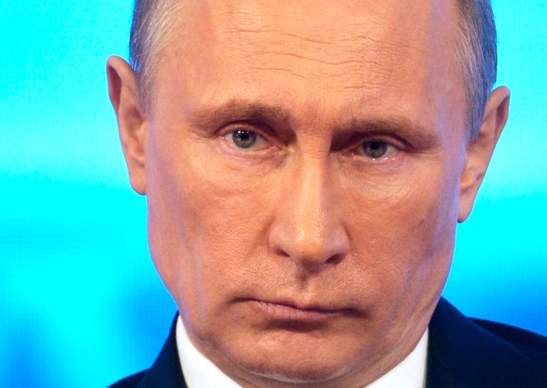 Russian President Vladimir Putin takes part in a televised call-in show with the nation in Moscow, Thursday, April 17, 2014. President Vladimir Putin on Thursday rejected claims that Russian special forces are fomenting unrest in eastern Ukraine, but recognized for the first time that the troops in unmarked uniforms who had overtaken Ukraine's Crimean Peninsula before its annexation by Moscow were Russian soldiers. (AP Photo/RIA-Novosti, Alexei Nikolsky, Presidential Press Service)