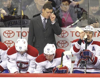 WINNIPEG, CANADA-DECEMBER 22: Montreal Canadiens head coach Randy Cunneyworth behind the bench during a game against the Winnipeg Jets in NHL action at the MTS Centre on December 22, 2011 in Winnipeg, Manitoba, Canada.(Photo by Marianne Helm/Getty Images)
