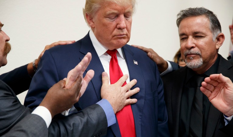 Trump says he is increasingly relying on his faith for strength and guidance. (AP Photo/ Evan Vucci)