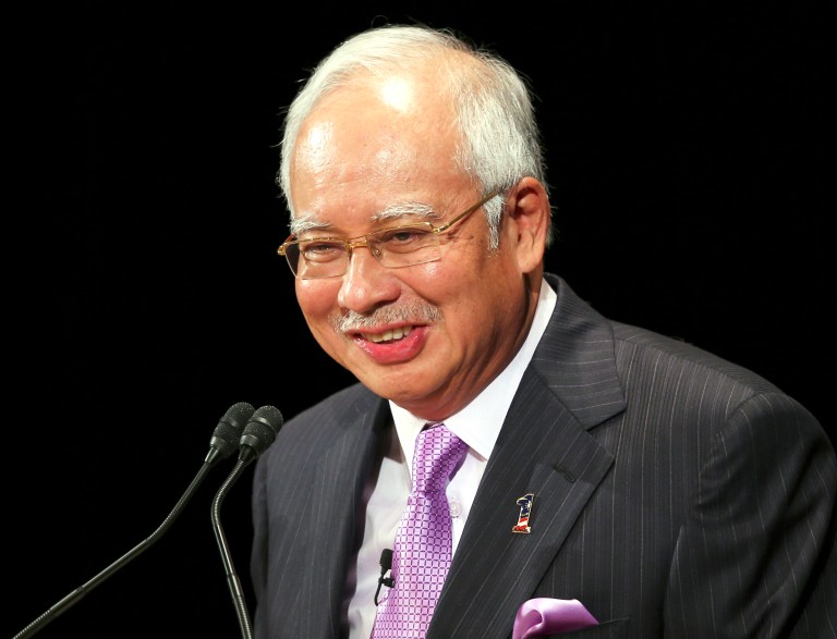 FILE - In this May 22, 2014, file photo, Malaysian Prime Minister Najib Razak delivers a keynote speech at the 20th International Conference on The Future of Asia in Tokyo. Razak on Thursday, July 10, 2014, chided a ruling party lawmaker for tweeting a salute to Adolf Hitler while praising Germany for making it to the World Cup final. (AP Photo/Koji Sasahara, File)