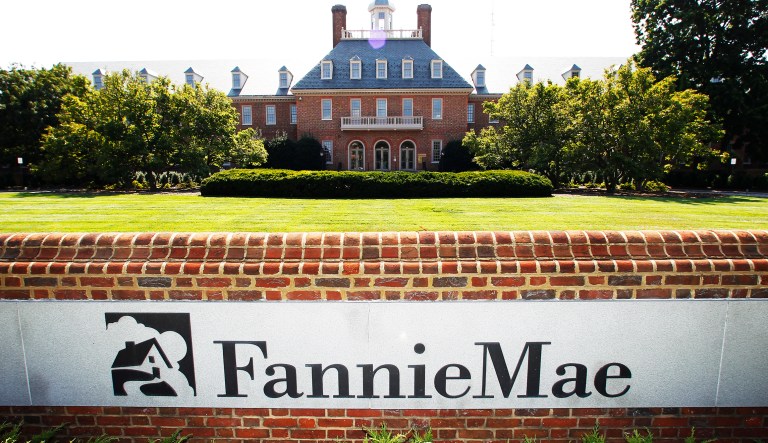Mortgage giant Fannie Mae is, in effect, collateral damage from the tax law. It has large deferred tax assets from the financial crisis, essentially losses that it is allowed to write off against tax liabilities. With lower tax rates in the future, those tax assets are now worth less, resulting in accounting losses. (AP Photo/Manuel Balce Ceneta, File)