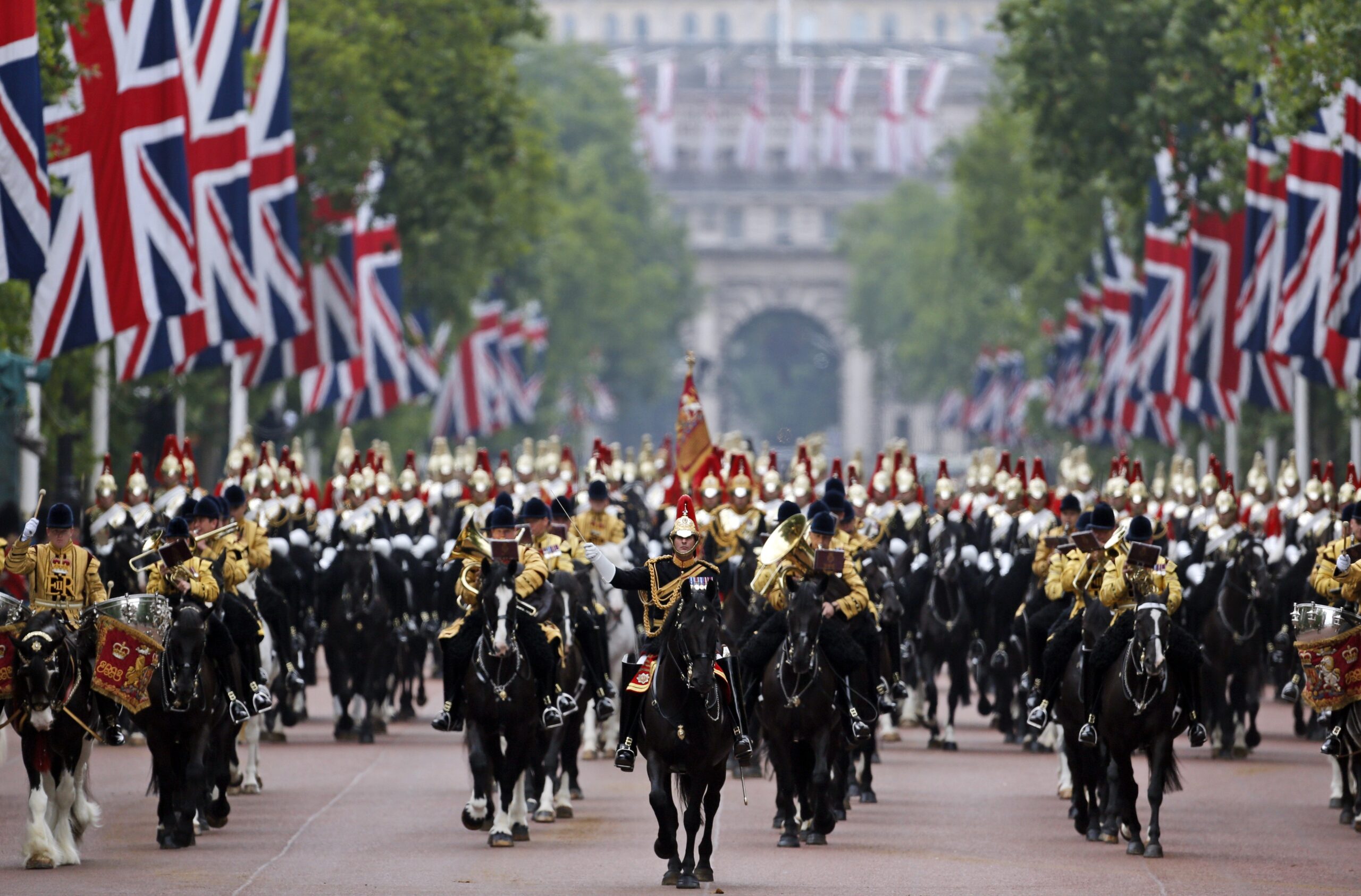 Troops parade in London for queen’s birthday