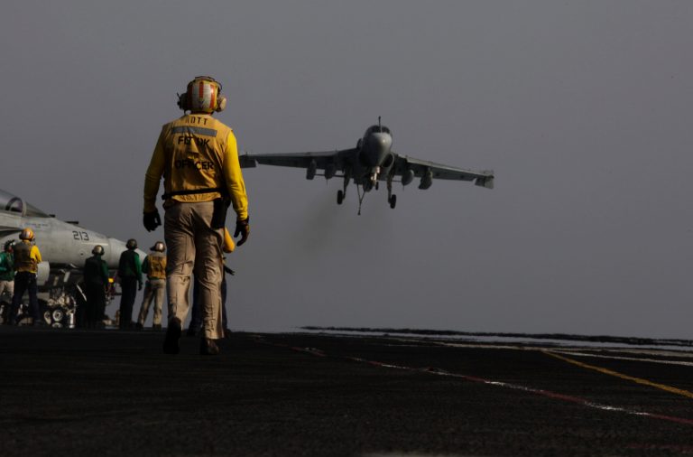 An EA-6B coming from Iraq lands on the flight deck of the U.S. Navy aircraft carrier USS George H.W. Bush on Aug. 10 in the Persian Gulf. (AP Photo/Hasan Jamali)