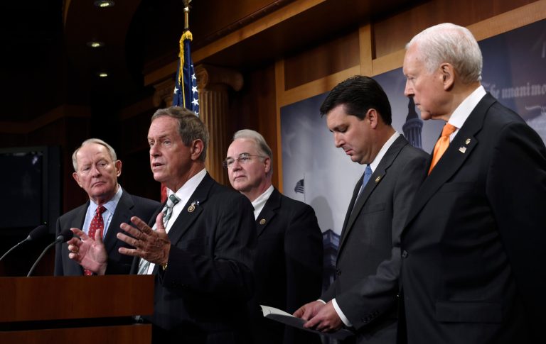 Rep. Joe Wilson, R-S.C., second from left, speaks during a news conference on Capitol Hill in Washington, Monday, July 27, 2015, where the Employee Rights Act was discussed. (AP Photo/Susan Walsh)