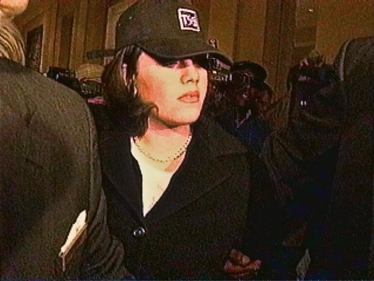 Monica Lewinsky walks through the lobby of a hotel in Washington, Saturday afternoon Jan. 23, 1999. (AP Photo/APTN, Lindsey Graves)