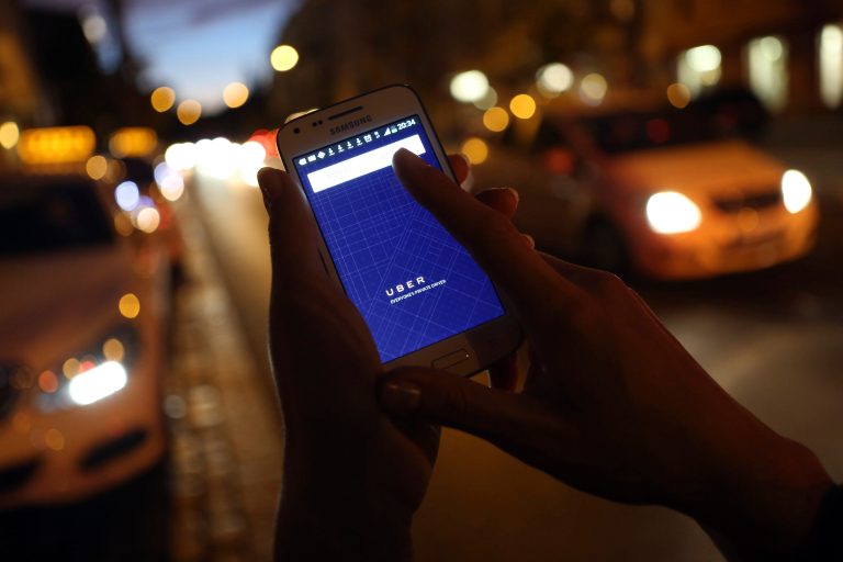 Uber is flouting the established order by setting up shop and winning the hearts of customers without first seeking the blessing of regulators. In response, infuriated regulators around the world have declared team Uber to be outlaws. But they are outlaws with public support.ÃÂ (Photo by Adam Berry/Getty images)